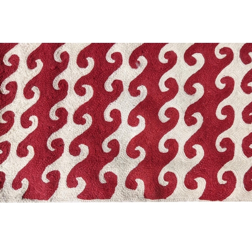 387 - OKA RUG, red and white dark woven pattern, 300cm x 240cm.