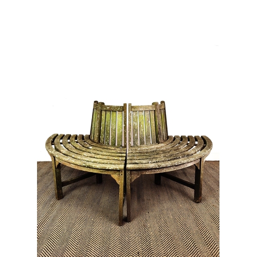 421 - TREE BENCH, weathered wood construction, splits into two sections down middle, 177cm W approx.