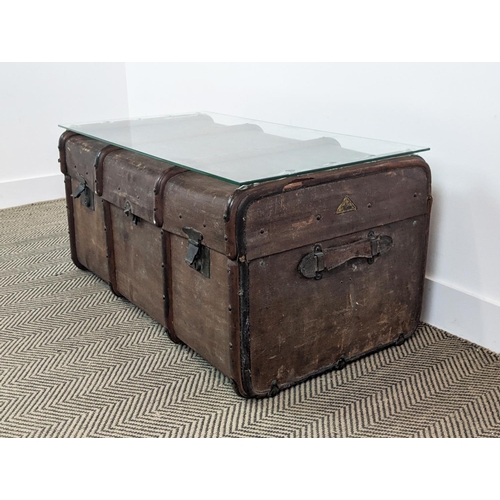 99 - TRUNK/LOW TABLE, 19th century canvas and hinged bearing name M. Nelson now adapted with a secured gl... 