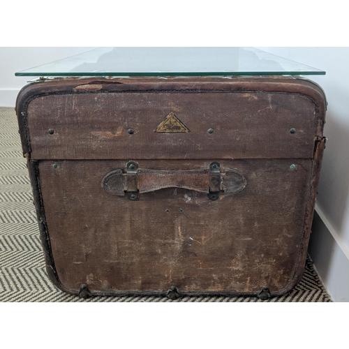 99 - TRUNK/LOW TABLE, 19th century canvas and hinged bearing name M. Nelson now adapted with a secured gl... 