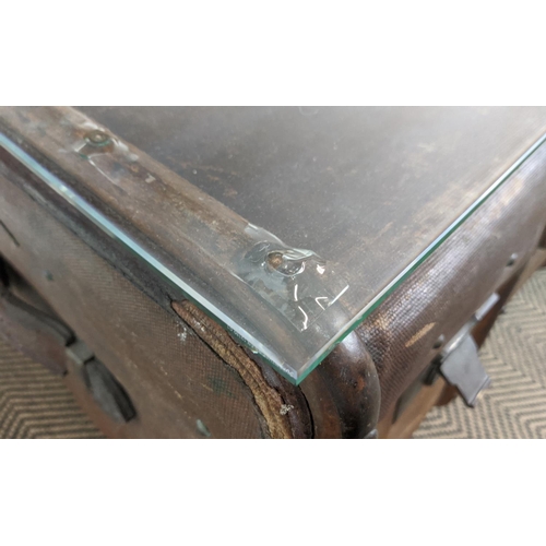 99 - TRUNK/LOW TABLE, 19th century canvas and hinged bearing name M. Nelson now adapted with a secured gl... 