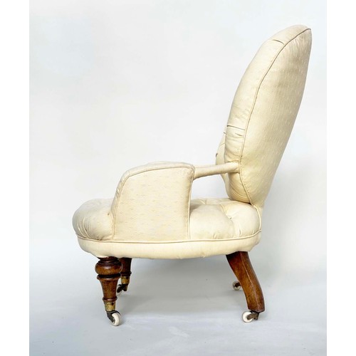 107 - SLIPPER ARMCHAIR, 19th century button upholstered, yellow fabric with turned front supports, 46cm W.