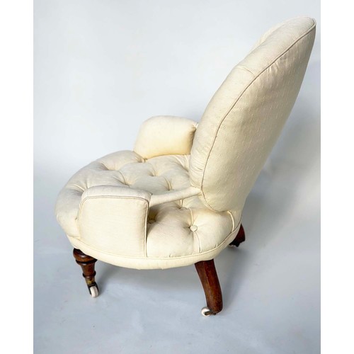 107 - SLIPPER ARMCHAIR, 19th century button upholstered, yellow fabric with turned front supports, 46cm W.