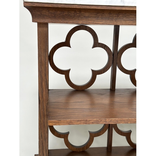 126 - OKA OPEN BOOKCASE, tray top oak with two shelves and quatrefoil panel sides, 109cm x 77cm H x 44cm.