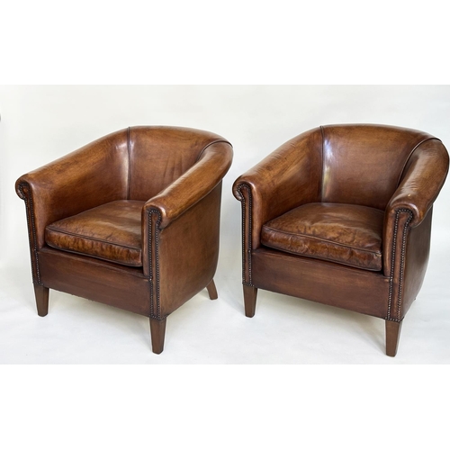 133 - TUB ARMCHAIRS, a pair, brass studded, hand finished soft tan brown leather with bar back and taperin... 