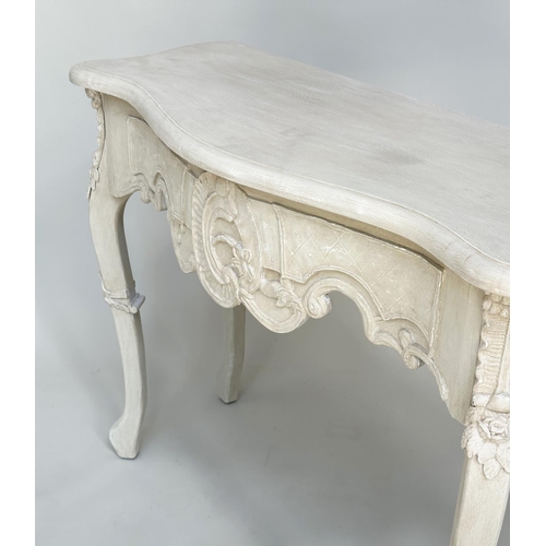 142 - CONSOLE TABLE, Italian style grey painted serpentine fronted with 'C' scroll centre and shaped suppo... 