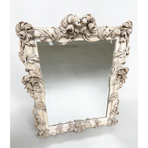 150 - WALL MIRROR, Italian style carved hardwood with trailing foliate and floral frame enclosing a bevell... 