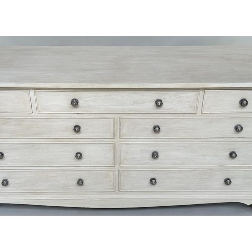 151 - LOW CHEST, Georgian style grey painted with nine drawers and bracket supports, 74cm H x 153cm W x 47... 