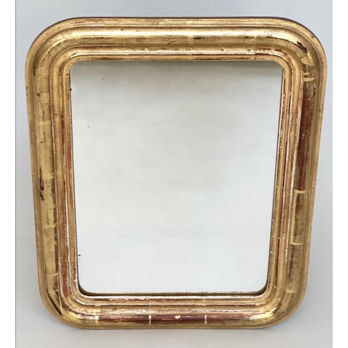 152 - WALL MIRROR, 19th century French giltwood and gesso rectangular with arched corners, label to verso,... 