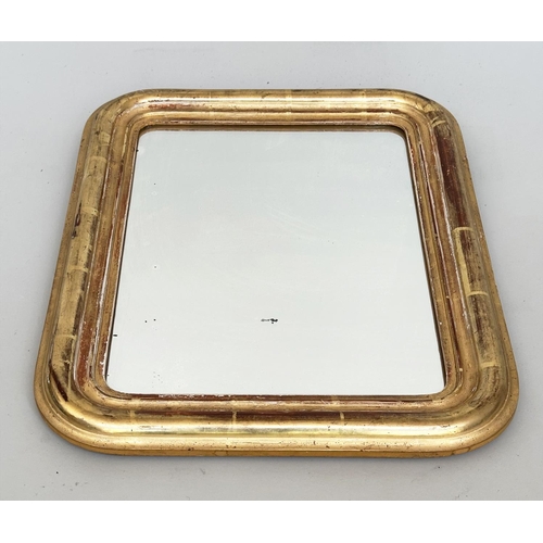 152 - WALL MIRROR, 19th century French giltwood and gesso rectangular with arched corners, label to verso,... 