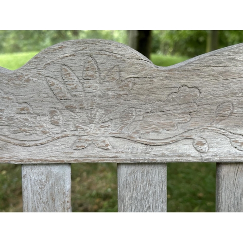 157 - GARDEN BENCH BY BRIDGMAN & CO, well weathered teak with shaped, incised top rail, slatted seat and s... 