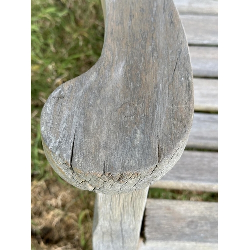 157 - GARDEN BENCH BY BRIDGMAN & CO, well weathered teak with shaped, incised top rail, slatted seat and s... 