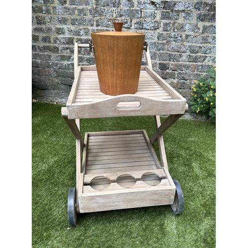 218 - GARDEN TROLLEY, vintage teak with two tiers with tray together with a 1960's period teak ice bucket,... 