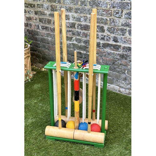 220 - CROQUET SET, a vintage set on portable stand, 46cm x 99cm H.