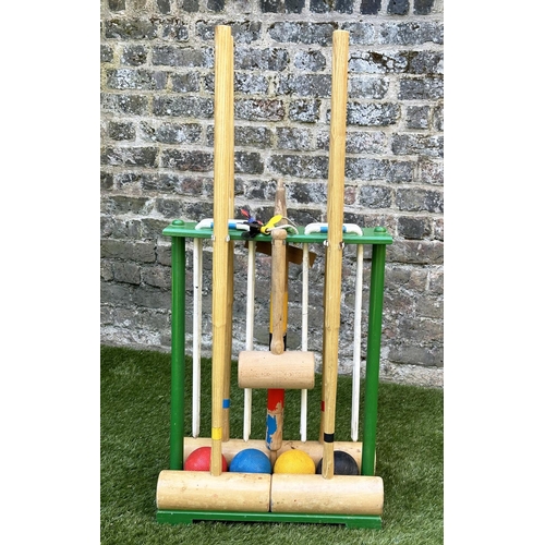 220 - CROQUET SET, a vintage set on portable stand, 46cm x 99cm H.