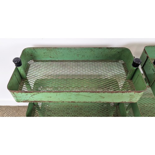 242 - WORKSHOP TROLLEYS, a pair, mid 20th century original green painted metal each with three tiers (on c... 