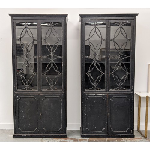 422 - BOOKCASES, a pair, Georgian style, glazed top sections, with cabinets to base, 99cm x 41cm x 214cm. ... 