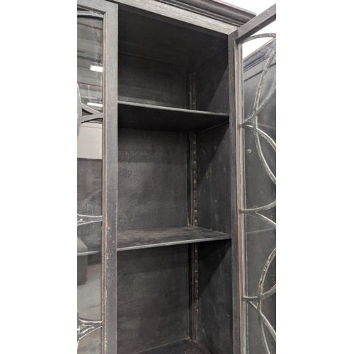 422 - BOOKCASES, a pair, Georgian style, glazed top sections, with cabinets to base, 99cm x 41cm x 214cm. ... 