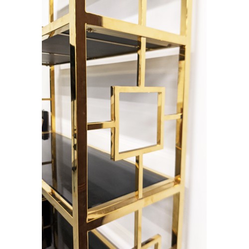 444 - ETAGERE, gilt metal with smoked glass shelves, 195cm H x 107cm x 38cm.