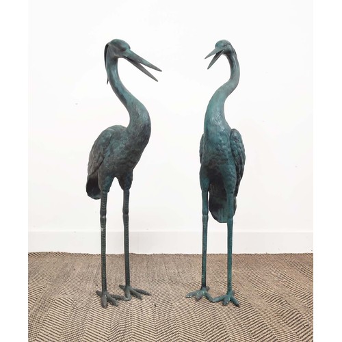 479 - CRANES, a set of two, cast metal, 98cm H at tallest approx. (2)