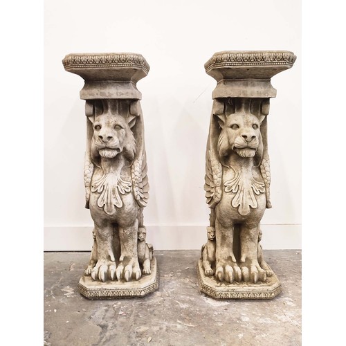 485 - LION PEDESTALS, a pair, composite stone, 78cm H. (2)