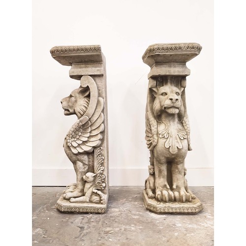 485 - LION PEDESTALS, a pair, composite stone, 78cm H. (2)