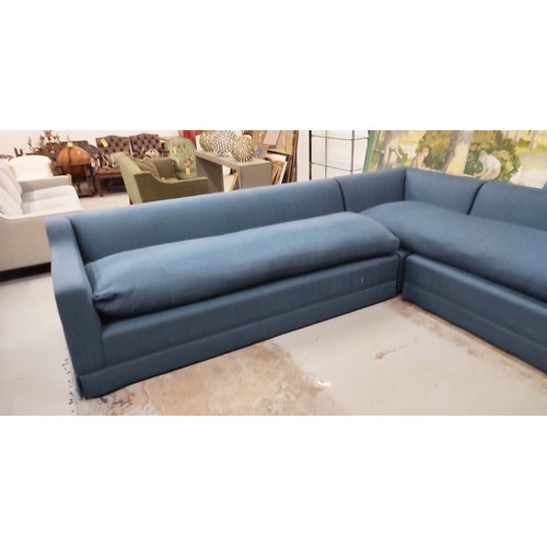 490 - CORNER SOFA, in blue fabric, in three sections, 330cm x 255cm x 84cm.