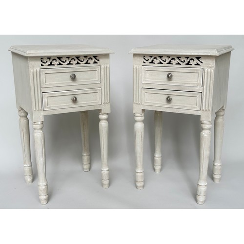 148 - BEDSIDE CHESTS, a pair, French style grey painted each with two drawers and pierced frieze, 40cm x 3... 