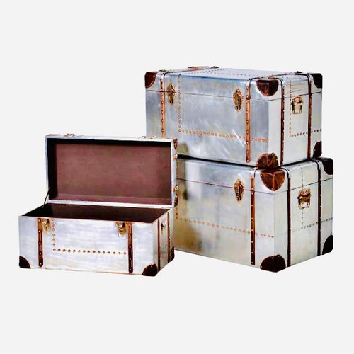 381 - TRUNKS, a graduated set of three, metal clad, largest 72cm H x 82cm x 46cm. (3)