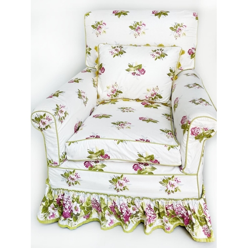 106 - COLEFAX AND FOWLER COUNTRY HOUSE ARMCHAIR AND FOOTSTOOL, Portman chintz upholstered, loose covers wi... 