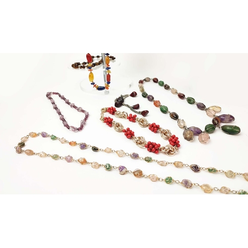 11 - A COLLECTION OF ASSORTED SEMI PRECIOUS GEMSTONE NECKLACES, including rock crystal quartz, tigers eye... 