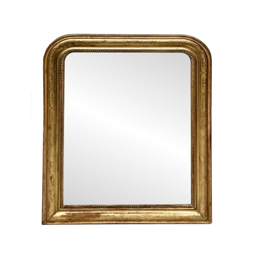 119 - WALL MIRROR, 19th century French giltwood and gesso with arched rectangular beaded and incised frame... 