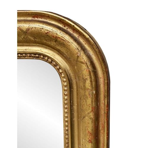 119 - WALL MIRROR, 19th century French giltwood and gesso with arched rectangular beaded and incised frame... 