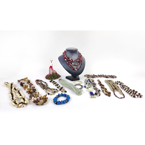 13 - A LARGE QUANTITY OF ASSORTED COSTUME JEWLLERY, including faux pearl necklaces, reconstituted glass b... 