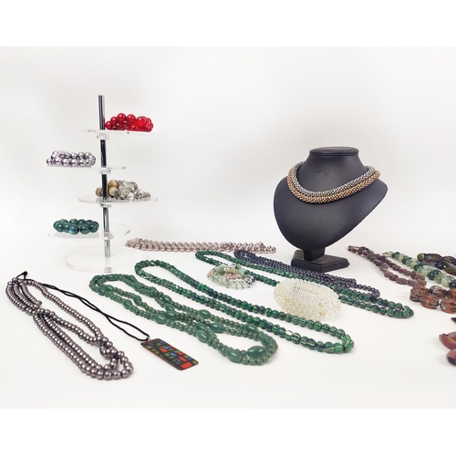 13 - A LARGE QUANTITY OF ASSORTED COSTUME JEWLLERY, including faux pearl necklaces, reconstituted glass b... 