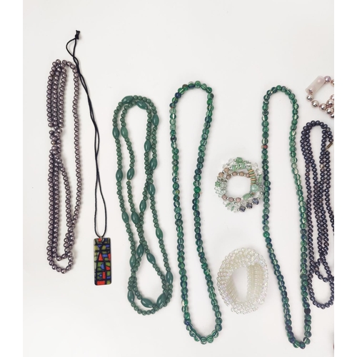 13 - A LARGE QUANTITY OF ASSORTED COSTUME JEWLLERY, including faux pearl necklaces, reconstituted glass b... 