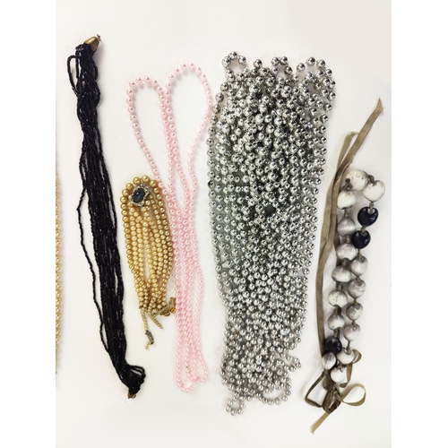 13 - A LARGE QUANTITY OF ASSORTED COSTUME JEWLLERY, including faux pearl necklaces, reconstituted glass b... 