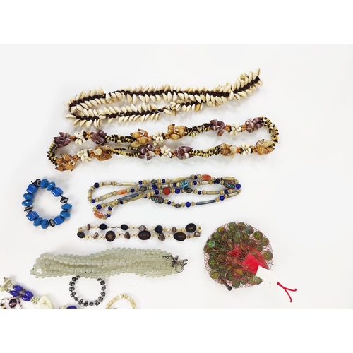 13 - A LARGE QUANTITY OF ASSORTED COSTUME JEWLLERY, including faux pearl necklaces, reconstituted glass b... 