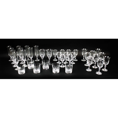 14 - A COLLECTION OF RIEDEL DRINKING GLASSES, each with hexagonal sectioned bases, comprising ten champag... 