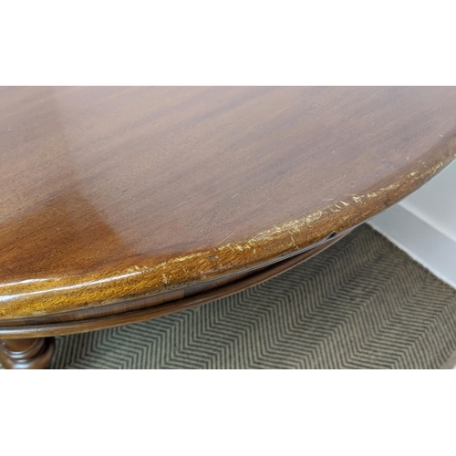 141 - DINING TABLE, Victorian mahogany with oval top and two extra leaves on brass castors, 74cm H x 136cm... 