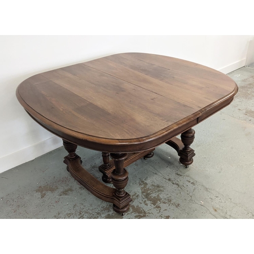 144 - DINING TABLE, late 19th century French walnut with four extra leaves on castors, 73cm H x 115cm W x ... 