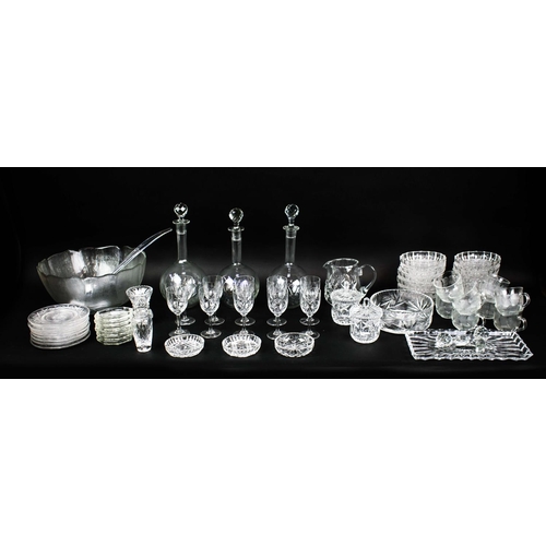 16 - A COLLECTION OF ASSORTED GLASSWARE, comprising twelve small dishes, three shaft and globe decanters ... 