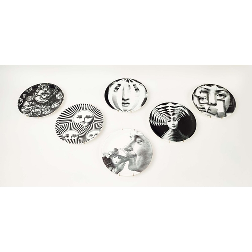 28 - FORNASETTI STYLE PLATES, six various monochrome designs, 20.5cm W. (6)