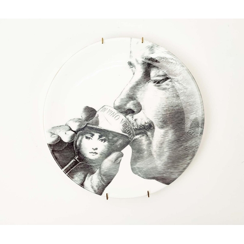 28 - FORNASETTI STYLE PLATES, six various monochrome designs, 20.5cm W. (6)