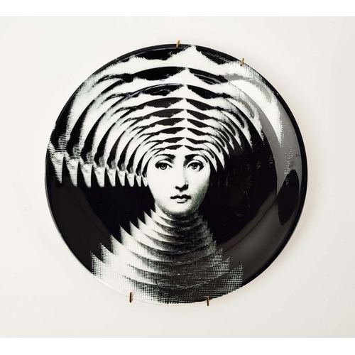 28 - FORNASETTI STYLE PLATES, six various monochrome designs, 20.5cm W. (6)