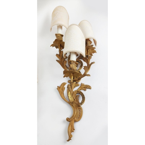 33 - WALL LIGHTS, a pair, Rococo style gilt bronze, 64cm H. (2)