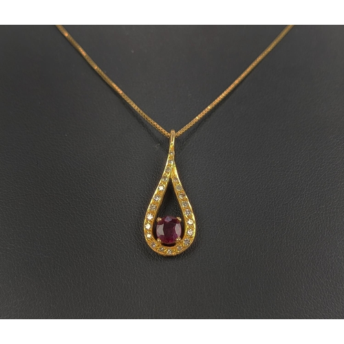 8 - AN 18CT GOLD RED STONE AND DIAMOND SET PENDANT NECKLACE, the oval mixed cut stone with a tear shaped... 