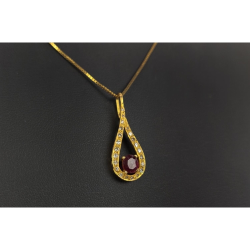 8 - AN 18CT GOLD RED STONE AND DIAMOND SET PENDANT NECKLACE, the oval mixed cut stone with a tear shaped... 