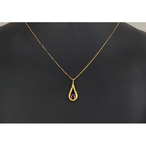 8 - AN 18CT GOLD RED STONE AND DIAMOND SET PENDANT NECKLACE, the oval mixed cut stone with a tear shaped... 