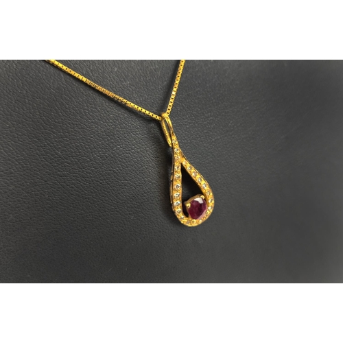 8 - AN 18CT GOLD RED STONE AND DIAMOND SET PENDANT NECKLACE, the oval mixed cut stone with a tear shaped... 